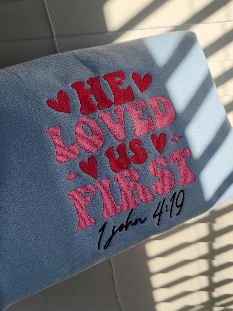 Embroidered He Loved Us First Sweatshirt, Bible Verse, Gift Sweatshirt, Valentines Embroidered Sweater - Image 2