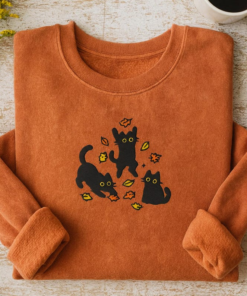 EMBROIDERED Cute Black Cat Pouncing Leaves Sweatshirt, Cozy Cat Lover Sweatshirt, Autumn Vibes Tee, Cozy Fall Halloween Embroidered Shirt