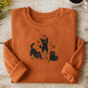 EMBROIDERED Cute Black Cat Pouncing Leaves Sweatshirt, Cozy Cat Lover Sweatshirt, Autumn Vibes Tee, Cozy Fall Halloween Embroidered Shirt