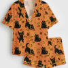 Women's Black Cat Pouncing Leaves Cozy Fall Halloween Short Sleeve Satin Pajama Set